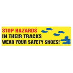 Indoor/outdoor banner printed on one side with a safety message promoting foot protection. Constructed of poly sheeting, nominal size 28 in x 96 in. Suitable for use in industrial facilities, warehouses, and construction sites to communicate workplace safety requirements.