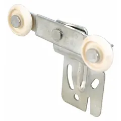 This hanging door roller from PRIME-LINE measures 2-1/2 inches in length and 3-3/4 inches in width, with a maximum weight capacity of 60 lb per pair. It is used as a replacement component in sliding door applications for maintenance or repair.