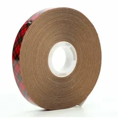 This reverse-wound adhesive transfer tape features a permanent acrylic adhesive on a kraft paper liner. It is transparent and UV-resistant, with a thickness of 5 mil and a length of 36 yards. Used for mounting, splicing, and laminating where a clean, durable bond is required.