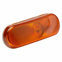 Amber oval turn signal light with incandescent lighting. Features a grommet mount for permanent installation and a pigtail electrical connection. Complies with FMVSS 108 standards. Overall height 2 1/4 in. Used on trucks, trailers, and heavy equipment for turn indication or hazard warning