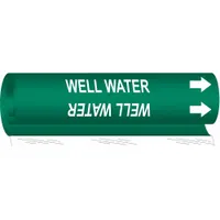 Green wrap-around pipe marker with white legend 'Well Water' and directional arrows. Fits pipe O.D. from 1-1/2 to 2-3/8 in. Used to identify well water lines and indicate flow direction in piping systems
