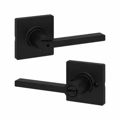 This KWIKSET privacy lever lockset is designed for interior doors requiring push-button locking from the inside, such as bathrooms or bedrooms. It features a rose-style trim with a black painted zinc finish and is ADA compliant for accessibility. The ANSI F76 function provides privacy locking without a visual indicator. Not ligature-resistant.