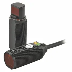 Plastic-bodied M18 threaded photoelectric sensor from the E3FA series with a built-in 4-pin M12 direct connector. Operates on 10-30V DC supply with PNP output. Suitable for object detection in industrial automation applications such as packaging, material handling, and assembly systems.