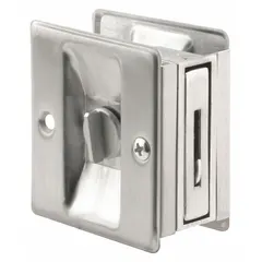 This pocket door pull handle is made of brass with a satin chrome finish. It features a tray/lever style with unthreaded mounting holes. Suitable for cabinet doors, drawers, or sliding panels where a flush grip is needed.