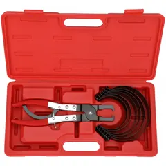 This metal piston ring tool set is used for assembling and disassembling pistons in engine systems. Includes six metal bands covering ring sizes from 2-7/8 in to 4-3/8 in. Width 42 cm.