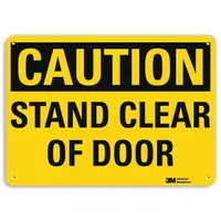 This caution sign is made of plastic with a nominal size of 10 in x 14 in and a thickness of 0.055 in. It features mounting holes for wall installation and is not retroreflective or glow-in-the-dark. Suitable for indoor or well-lit areas where clear visual warnings are needed