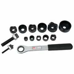 This 15-piece knockout punch driver set is used to create 3/4-inch diameter holes in sheet metal. It accommodates steel up to 10 to 12 gauge maximum thickness. The set includes a driver, dies, and punch components for manual operation, suitable for electrical enclosures and panel fabrication.