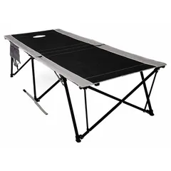 This folding cot provides a portable sleeping surface suitable for camping, emergency response, or temporary shelter. It measures 33 inches wide and folds to a compact 7-inch width for storage. A carry bag is included for transport.