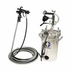 This Graco Stellair Ace pressure tank holds 5 gallons of paint or coating and is designed to supply consistent material pressure to spray guns in industrial finishing, automotive refinishing, and woodworking applications. It is compatible with air-assisted spray systems for smooth application.
