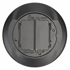 Round floor box cover and carpet flange made of cast aluminum with a smooth black finish. Provides a flush-mount interface for floor boxes in commercial or industrial settings, protecting wiring while blending with carpeted floors.