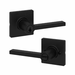 This KWIKSET office lever lockset is ADA compliant, featuring a rose design and no message function. It is constructed with a black painted zinc finish and is not ligature-resistant. Suitable for interior commercial doors in standard office, retail, or institutional settings where accessibility is required.