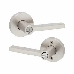 This KWIKSET office lever lockset features a satin nickel-plated zinc construction with a rose trim. It is ADA compliant for accessible lever operation. Suitable for interior commercial doors in office, healthcare, or educational settings where no message is required.