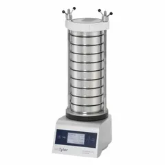 This vibration-based mechanical sieve shaker accepts 8-inch diameter sieves and holds up to 9 full-size sieves. It is used for particle size analysis and separation of granular materials in laboratory settings.