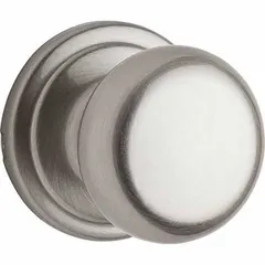 This passage knob lockset is designed for interior doors that do not require locking, such as hallways or closets. It features a Nickel finish and a Rose lockset style. The ANSI Hall function allows free turning from either side, making it suitable for high-traffic areas where privacy is not needed.