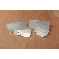 Blank valve tags made of aluminum laminated material in silver finish. Each tag is rectangular, 0.02 in thick, and supplied in packs of 25. Suitable for identifying and labeling valves, equipment, and components in industrial facilities