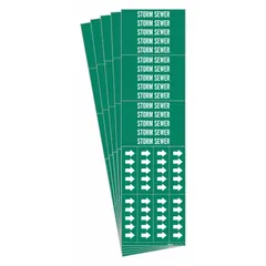 Green adhesive pipe marker with white legend text reading 'Storm Sewer' and directional arrows. Designed for pipes with an outside diameter of 3/4 inch and smaller. Each pack contains 5 markers, with 3 pipe markers per unit. Used for identifying storm sewer lines in industrial piping systems.