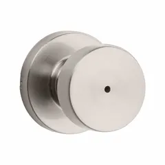 This KWIKSET privacy knob lockset is designed for interior doors requiring privacy, such as bathrooms or bedrooms. It features a nickel finish and a rose-style trim. The lockset is suitable for residential or light commercial applications where a privacy function is needed.