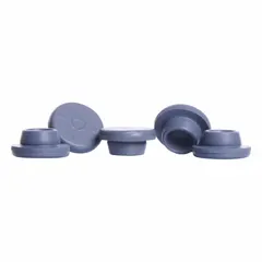 This synthetic rubber stopper is designed for sealing laboratory glassware such as flasks and test tubes. Made from chlorobutyl material, it provides a reusable, non-reactive seal. Dimensions: 20 mm top diameter, 7.6 mm bottom diameter, 8.5 mm overall height. Color: gray.