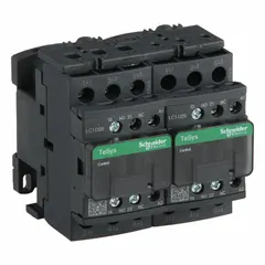 This reversing IEC contactor from SCHNEIDER is rated for 25 A with 3 poles and 3 normally open (NO) contacts, operated by a 24V AC coil. It does not include integrated surge suppression. Used for controlling the direction of three-phase motors in applications such as conveyors, hoists, and pumps.