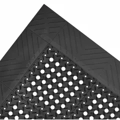 This drainage mat features a diamond-plate pattern on a black PVC surface with a beveled edge. It allows water and debris to pass through, reducing slip hazards in wet areas such as machine shops, processing plants, and entryways. The mat is non-reversible and measures 42 inches by 8 feet with a 1-inch thickness.
