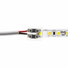 Screw-terminal tape-to-wire connector for tape and linear light systems. Accepts wire gauges from 20 AWG to 16 AWG. Used to make secure electrical connections between tape light strips and supply wiring in low-voltage LED lighting installations.
