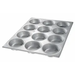 This 12-slot muffin pan is made of 26 ga aluminized steel with a silver finish, measuring 15 1/2 inches in overall width. It is designed for baking muffins or cupcakes in commercial or home kitchens, providing even heat distribution.