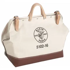 Canvas wide-mouth tool bag in brown with one exterior pocket and one interior pocket. The wide opening allows easy access to hand tools, test instruments, and small parts. Suitable for carrying and organizing tools on job sites.