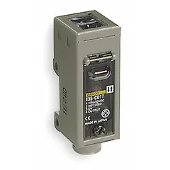 Rectangular photoelectric sensor with zinc body and prewired bare-wire cable. Operates on 10-30V DC supply. NEMA 6P enclosure rating permits use in washdown and dusty environments. Suitable for object detection in industrial automation applications such as packaging, material handling, and assembly lines.