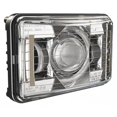 This LED headlight features integrated heating to prevent ice and snow buildup, ensuring consistent light output in cold conditions. It provides a high beam pattern and uses an H4 connector for electrical connection. The low-profile panel mount with recessed style allows for flush installation on vehicles. Typical applications include heavy-duty trucks and equipment operating in freezing environments where de-icing is required.