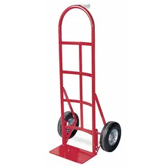 This hand truck features a red steel frame with a single-pin handle and semipneumatic 10-inch wheels. It is used for moving heavy loads in warehouses, factories, and delivery settings, handling rough surfaces and stairs.