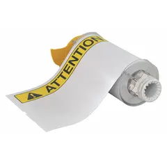 White vinyl label roll with ATTENTION header, measuring 7 in x 10 in and 10 in x 7 in. Features acrylic adhesive and is compatible with BBP85 printer series. Used for facility safety and identification, marking areas or equipment requiring immediate notice.