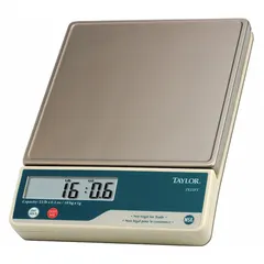 Food scale with a 7 1/8-inch square weighing surface and 0.1 oz readability. Overall height is 2 3/4 inches. Not IP rated. Suitable for portion control and ingredient weighing in commercial kitchens and food service operations.