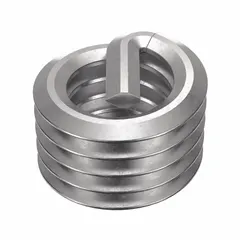 Free-running helical insert with tanged tang for M6-1.00 right-hand coarse metric threads. Made of 18-8 stainless steel with dry film lubricant, tensile strength 200,000-250,000 psi. Used to repair or reinforce tapped threads in metal components, providing a durable internal thread for fasteners.