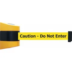This wall-mount retractable belt barrier features a 30 ft yellow belt with black Caution messaging. The frame is black and yellow. It is used for crowd control and to designate restricted areas or temporary hazards in industrial and public settings.