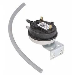 Pressure switch for monitoring air or gas pressure in HVACR systems. Used in furnaces, boilers, and rooftop units to verify proper airflow or combustion pressure. Replacement part for heating and cooling equipment.