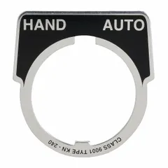 Half-round legend plate with black finish and silver metallic aluminum construction. Features a notch and English 'Hand-Auto' marking. Overall height 1 3/4 in, overall width 1 5/8 in. Used to label push-button controls in industrial control stations.