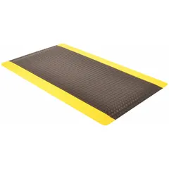 This wear-resistant antifatigue mat measures 4 ft x 75 ft with a 9/16 in thickness. It is black with a yellow border, constructed from vinyl over PVC foam, and features an anti-slip backing. Suitable for standing work areas such as assembly lines, workstations, and industrial aisles.