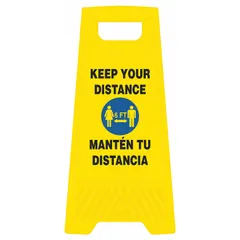 Yellow polypropylene folding floor sign with nominal size 24 in x 12 in. Displays bilingual message 'Keep Your Distance - 6 ft. - Manten Tu Distancia' to indicate spacing guidelines. Not retroreflective. Suitable for use in industrial facilities, warehouses, and public areas to promote social distancing.
