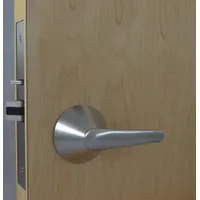 This passage lever lockset is constructed of stainless steel with a satin finish. It is ADA compliant and features a ligature-resistant design, suitable for areas where privacy locking is not required, such as corridors, closets, and meeting rooms. The LSL lever style provides easy operation, and the lockset has no visual indicator message