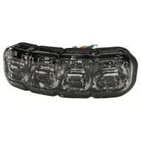 Rectangular LED warning light with amber/blue output, 1/2 in overall width, and 69 selectable flash patterns. Operates on 12-24V DC with blunt cut wires. Includes bezel for two-bolt bracket mount. Used on service trucks, utility vehicles, and construction equipment to alert personnel in work zones and loading docks