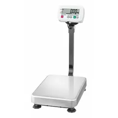 The A&D WEIGHING SE-60KAL is a food scale with an LCD display, readability of 0.02 lb/0.01 kg, and a weighing surface of 15 3/8 in width by 20 7/8 in depth. It features an IP68 rating for dust and water ingress protection and an RS-232C port for data communication. Suitable for commercial kitchens and food processing environments where wet conditions are present.