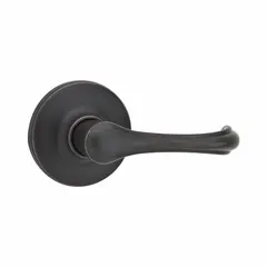 Storeroom lever lockset with rose style, ANSI function F75 (Hall). Keyed entry from outside, free egress from inside. Satin bronze-plated, blackened, satin relieved, clear coated zinc finish. ADA compliant. Bronze type. Suitable for interior doors in commercial or institutional settings.