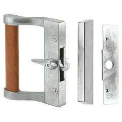 This recessed handle for sliding doors measures 4 7/16 inches in height and 2 inches in width. It is designed for use in sliding door applications where a flush-mounted handle is required for operation and locking.