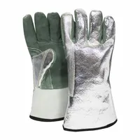 Aluminized gloves with Carbon Kevlar construction and wool liner, rated for continuous exposure up to 285°F. Gauntlet cuff design extends protection to the forearm. Suitable for high-heat tasks such as furnace work, foundry operations, and glass handling
