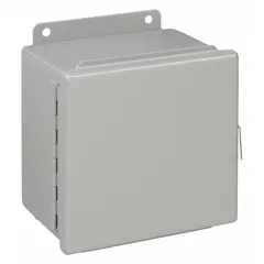 This WIEGMANN steel enclosure measures 4 x 4 x 3 inches and is rated NEMA 12/13 for protection against dust, dirt, oil, and coolant seepage. It features a solid hinged cover secured by clamps. Knockouts are not included. Typical applications include housing electrical controls, terminals, and instruments in indoor industrial environments.