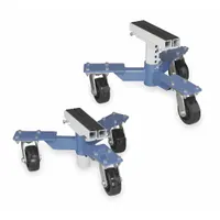 Steel-framed wheel dolly with 800 lb lifting capacity, 5 in tires, and dimensions 25-1/2 in x 23-3/32 in x 9-1/2 in. Used in automotive repair and garage settings to lift and position vehicles during service