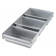 This open top bread pan from CHICAGO METALLIC is made of aluminized steel for even heat distribution. It features 3 slots, each with an overall width of 9 1/4 inches and depth of 2 3/4 inches. Suitable for baking multiple loaves simultaneously in commercial or high-volume bakery settings.