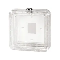 This plastic thermostat guard features a clear snap-on cover and solid base with double-wall construction. It includes a lock and key for securing thermostats against tampering and unauthorized adjustments. Inside dimensions are 4-7/16 in H x 4-7/16 in W x 2-1/4 in D; outside dimensions are 5-5/8 in H x 5-5/8 in W x 2-5/8 in D. Suitable for protecting HVAC thermostats in commercial or industrial settings.