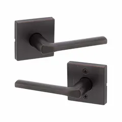 This storeroom lever lockset features a rose style with a satin bronze-plated, blackened, satin relieved, clear coated zinc finish. It is ADA compliant and designed for ANSI F75 Hall function, suitable for interior doors requiring keyless passage in commercial settings.