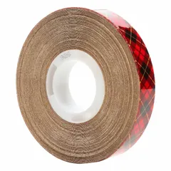 This reverse-wound adhesive transfer tape features a permanent acrylic adhesive on a transparent kraft paper liner. It is 1/2 inch wide, 18 yards long, and 5 mil thick. Suitable for mounting, splicing, and laminating in industrial assembly and fabrication where a permanent bond is required.